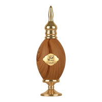 A close-up view of the Afaq Eau De Parfum bottle by Lattafa Pride, featuring a luxurious wooden design with elegant gold accents.