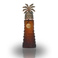 Luxurious Ajwaa EDP bottle by Lattafa Pride with a date-palm inspired design in a rich amber shade, exuding Arabian heritage and elegance.