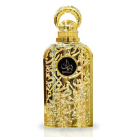 A close-up view of the Bayaan Eau De Parfum bottle by Lattafa, featuring a stunning gold design adorned with intricate Arabic calligraphy, exuding elegance and luxury.