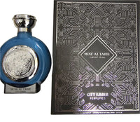 Musk Al Tahir perfume bottle paired with an elegant silver and black designed box by City Ember, showcasing the 100ml Eau De Parfum.