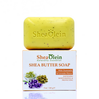 Shea Olein Shea Butter Soap bar displayed on its box, showcasing its natural Chamomile and Lavender Flower ingredients for skin soothing and moisturization.