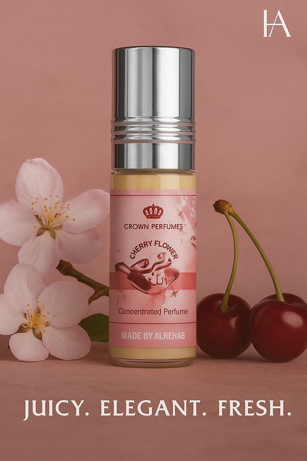 Al Rehab Cherry Flower 6ml roll-on perfume oil displayed with cherry blossom and cherry notes, HA Fragrances branded background, soft pink aesthetic, floral-green fragrance presentation.