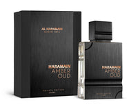 Al Haramain Amber Oud Private Edition EDP 120ML bottle displayed alongside its elegant black and copper box packaging, a premium unisex fragrance for sophisticated tastes.