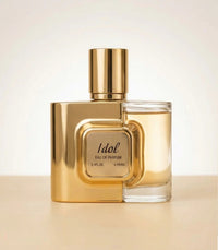 Bharara Beauty Mast Idol 3.4oz Eau De Parfum gold and clear glass bottle front view with metallic finish.