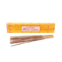 Goloka Nag Champa Agarbathi incense sticks box with three incense sticks placed in front, showcasing the premium 16g packaging.