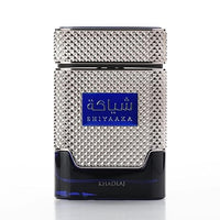 Close-up of Khadlaj Shiyaaka Blue Eau De Parfum for Men, showcasing its textured silver bottle and bold blue accents.