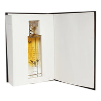 Adeeb Eau De Parfum by Lattafa – Elegant glass perfume bottle encased in a premium black and white book-style box, showcasing its unique design.