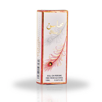 Mahasin Crystal Roll-On Perfume Oil 10ML packaging with delicate feather artwork and gold detailing, emphasizing its sophisticated and floral appeal.