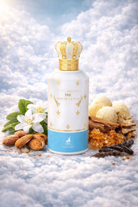 Maison Alhambra The White Cloud Eau de Parfum displayed in a white and gold bottle with almond, vanilla, and soft floral accents against a cloud-inspired background.