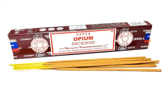 Satya Opium Incense 15g pack with neatly arranged incense sticks, showcasing its rich brown packaging and exotic fragrance.