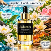 A glass dropper bottle of HA Fragrances 'Seduction' scented oil, styled with tropical floral and aquatic elements like white flowers, green leaves, and blue water splashes. The bottle has a black label and a gold dropper cap.