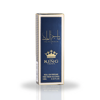 Taj Al Malik Roll-On Perfume Oil 10ML packaging with a royal navy blue and gold theme, showcasing its sophisticated and premium design.