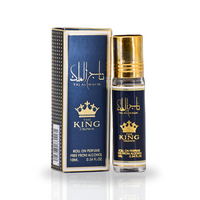 Taj Al Malik Roll-On Perfume Oil 10ML by Ard Al Zaafaran, featuring a luxurious navy blue and gold design with elegant packaging.