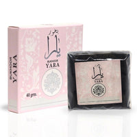 Yara Bukhoor by Ard Al Zaafaran, 40g, displayed with a pink floral box and securely packaged bukhoor pieces, offering elegance and quality.